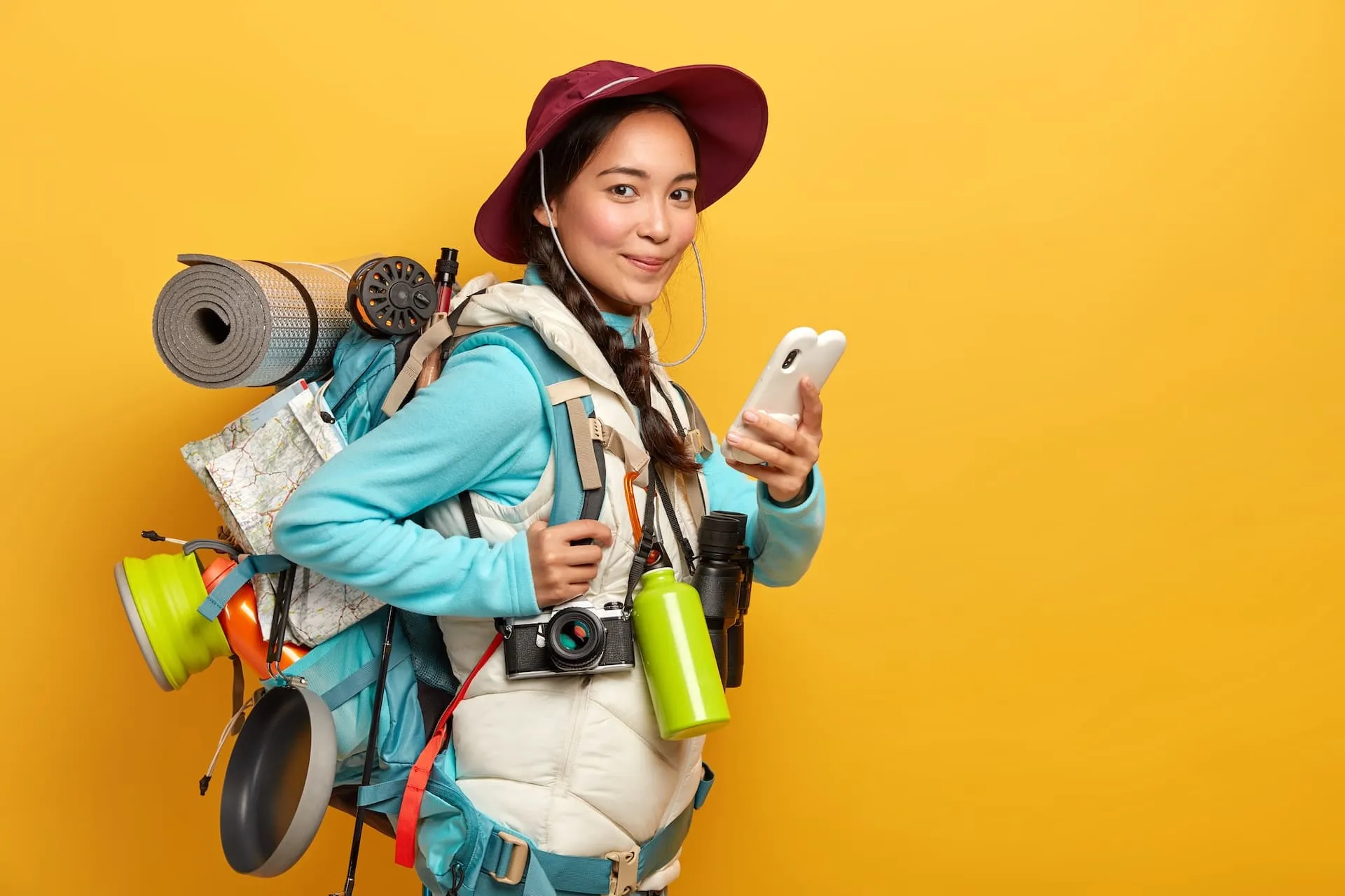 Traveler using phone with Airalo eSIM