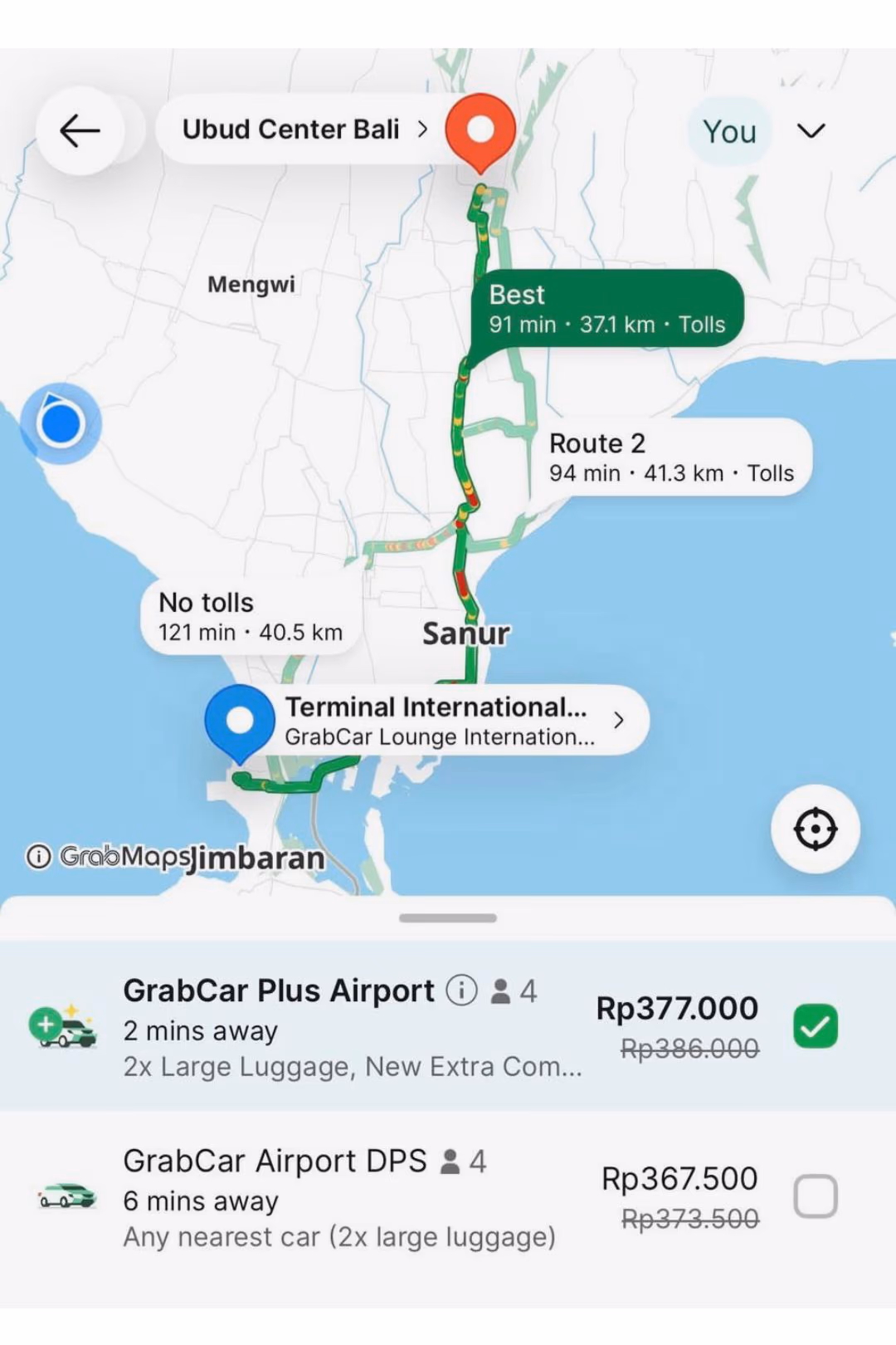 Grab fare from Bali airport to Ubud Center showing Rp377,000 for GrabCar Plus Airport